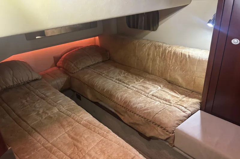 Slide: The Image of Luxurious bedroom interior of 2005 Sea Ray 420 Sedan Bridge yacht. - 24