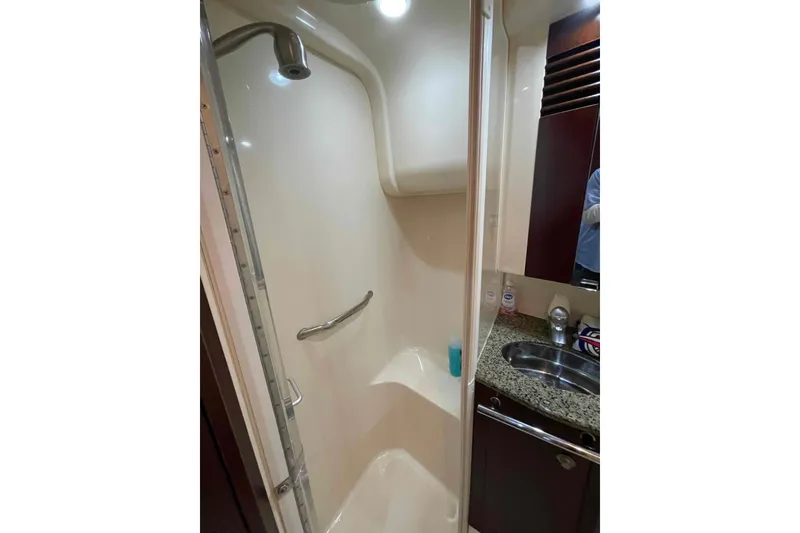 Slide: The Image of Luxurious cabin interior of 2005 Sea Ray 420 Sedan Bridge yacht. - 26
