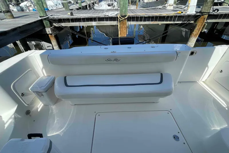 Slide: The Image of Twin beds in 2005 Sea Ray 420 Sedan Bridge cabin with warm lighting. - 30