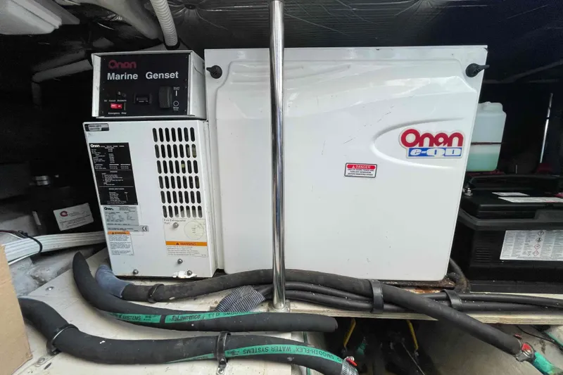 Slide: The Image of Interior of 2005 Sea Ray 420 Sedan Bridge with TV and wooden blinds. - 37