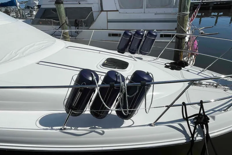 Slide: The Image of Luxurious bedroom interior of 2005 Sea Ray 420 Sedan Bridge yacht with cozy bedding. - 4