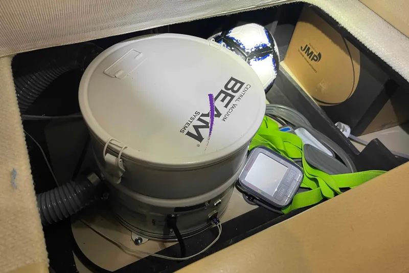 Slide: The Image of Engine room of 2005 Sea Ray 420 Sedan Bridge with visible gauges and components. - 56