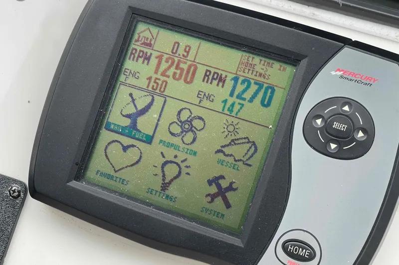 Slide: The Image of Boxes stored in a compartment of a 2005 Sea Ray 420 Sedan Bridge. - 65