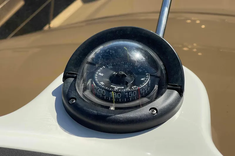 Slide: The Image of Mercury SmartCraft display on 2005 Sea Ray 420 Sedan Bridge showing engine data and settings. - 75