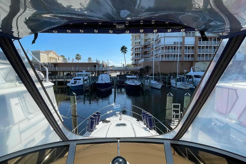 Slide: The Image of Control levers on a 2005 Sea Ray 420 Sedan Bridge yacht dashboard. - 81