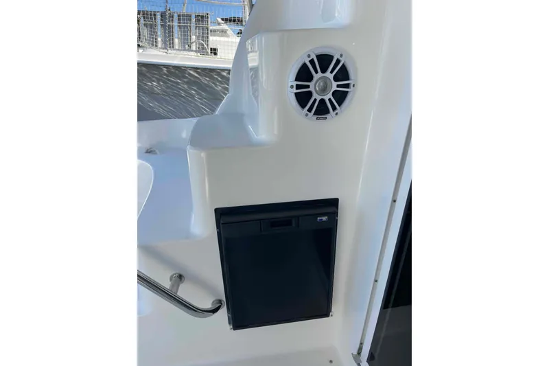 Slide: The Image of View from 2005 Sea Ray 420 Sedan Bridge, overlooking marina with boats and buildings. - 91