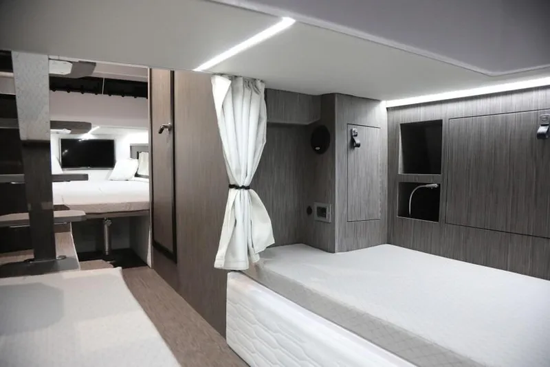 Slide: The Image of Luxurious interior of 2026 Ranieri Cayman 45.0 Executive yacht with modern design and cozy sleeping area. - 9