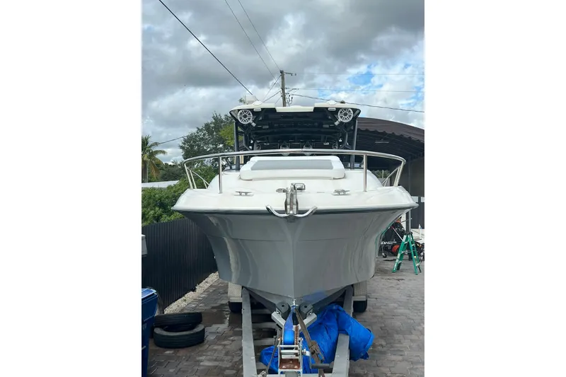 Slide: The Image of 2006 Hydra-Sports Vector 3300 VX boat with Yamaha outboard engines on trailer. - 3