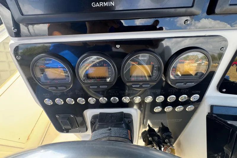 Slide: The Image of 2006 Hydra-Sports Vector 3300 VX dashboard with Yamaha gauges and Garmin display. - 35