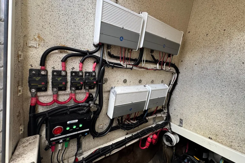 Slide: The Image of Electrical system of a 2006 Hydra-Sports Vector 3300 VX boat, featuring wiring and circuit breakers. - 36