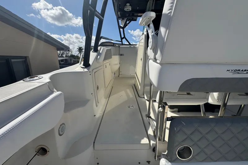 Slide: The Image of 2006 Hydra-Sports Vector 3300 VX boat interior with seating and storage compartments. - 42