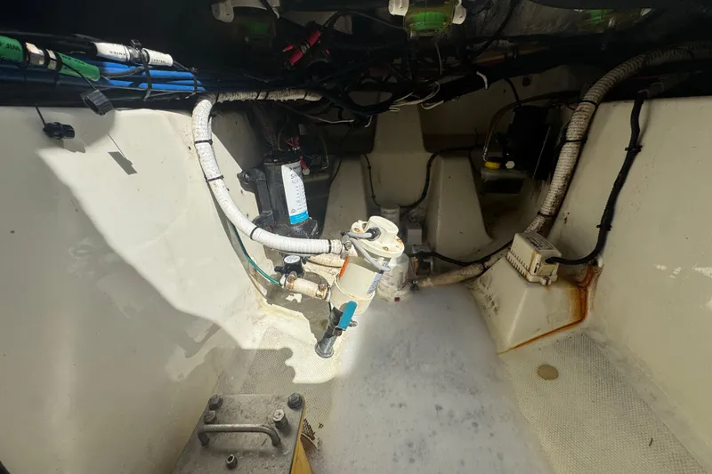 Slide: The Image of 2006 Hydra-Sports Vector 3300 VX engine compartment with wiring and components. - 43