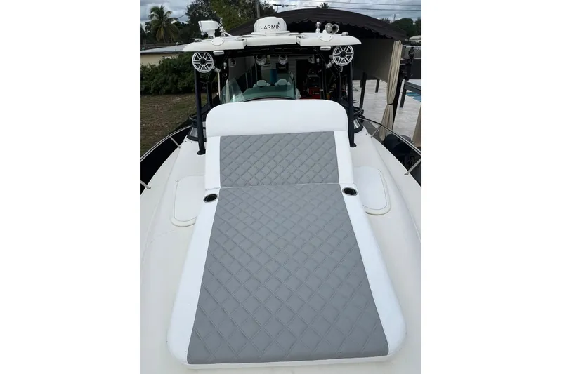 Slide: The Image of 2006 Hydra-Sports Vector 3300 VX boat on trailer, parked outdoors under cloudy sky. - 5