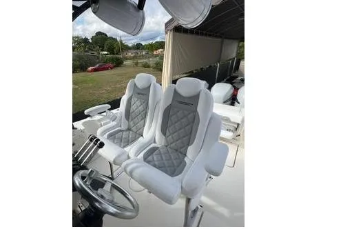 Slide: The Image of 2006 Hydra-Sports Vector 3300 VX boat on trailer, under a partly cloudy sky. - 6