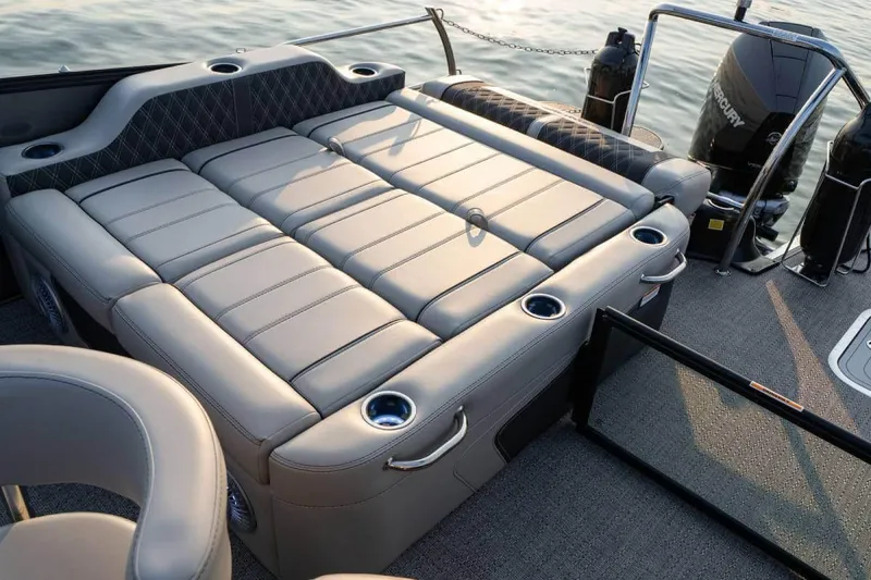Slide: The Image of Manufacturer Provided Image: 2026 Barletta Lusso 25UE pontoon boat with luxurious seating and cup holders. - 2