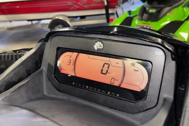 Slide: The Image of Dashboard of a 2021 Sea-Doo RXT-X 300 watercraft, displaying digital speedometer and controls. - 11