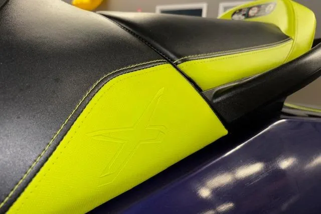 Slide: The Image of 2021 Sea-Doo RXT-X 300 seat detail in black and lime green. - 13