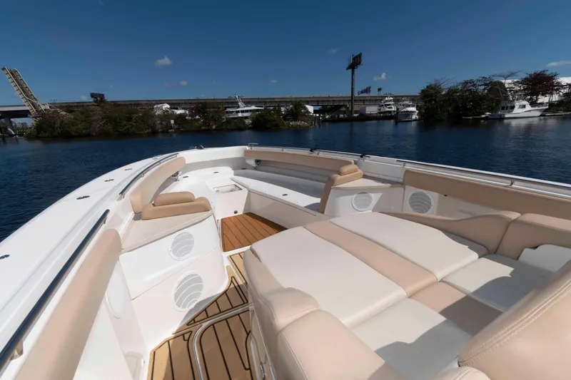 Slide: The Image of Luxurious 2021 HCB 53 Sueños boat interior with comfortable seating and scenic waterway view. - 17