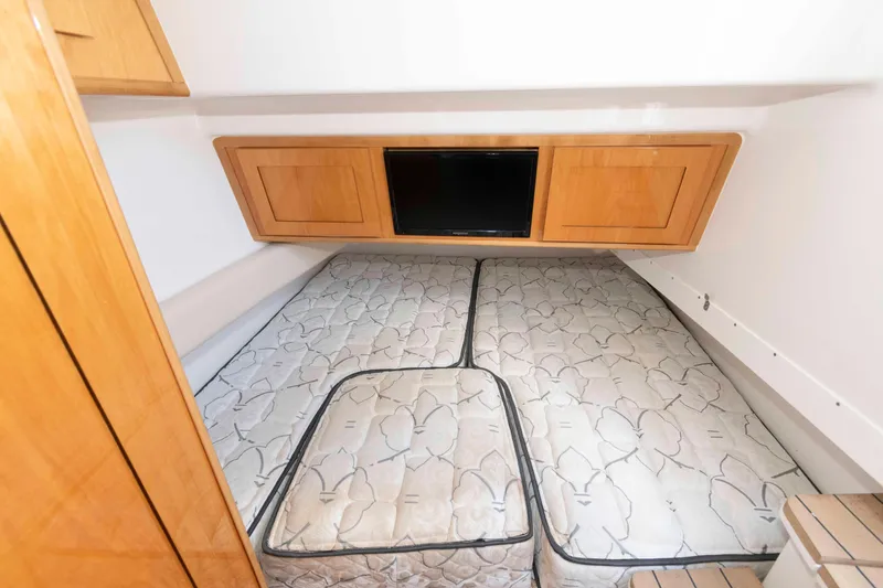 Slide: The Image of Bow view of 2021 HCB 53 Sueños yacht in a serene marina setting. - 29