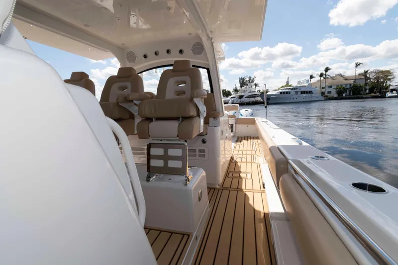 Slide: The Image of 2021 HCB 53 Sueños luxury boat interior with plush seating and sleek design. - 22