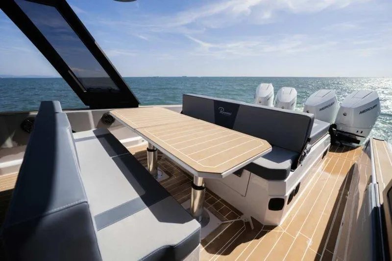 Slide: The Image of Luxurious 2026 Ranieri CAYMAN 50.0 HARD TOP yacht with elegant seating and ocean view. - 15