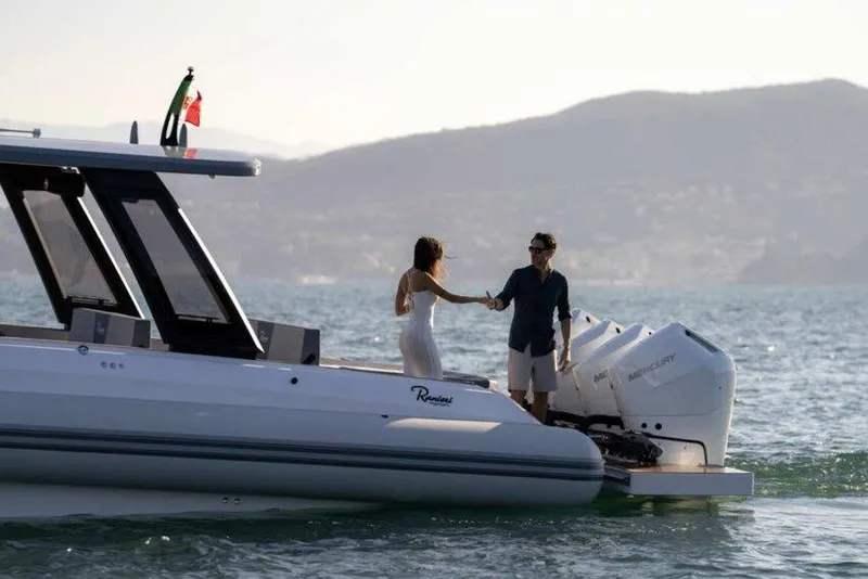 Slide: The Image of Couple enjoying a day on the 2026 Ranieri CAYMAN 50.0 HARD TOP boat. - 22