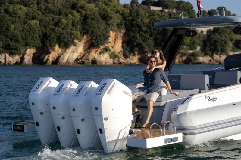 Slide: The Image of Couple enjoying a ride on 2026 Ranieri CAYMAN 50.0 HARD TOP boat. - 24