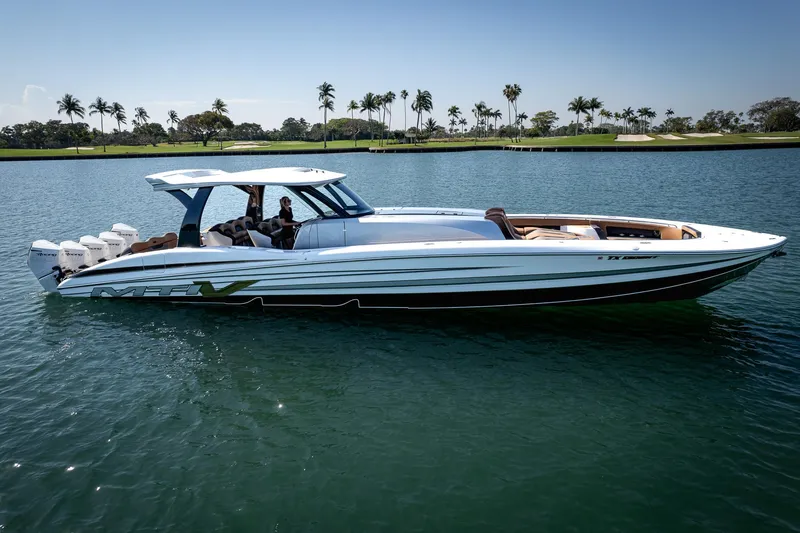 Slide: The Image of Luxury MTI V50 boat cruising on a sunny day, 2022 model. - 1
