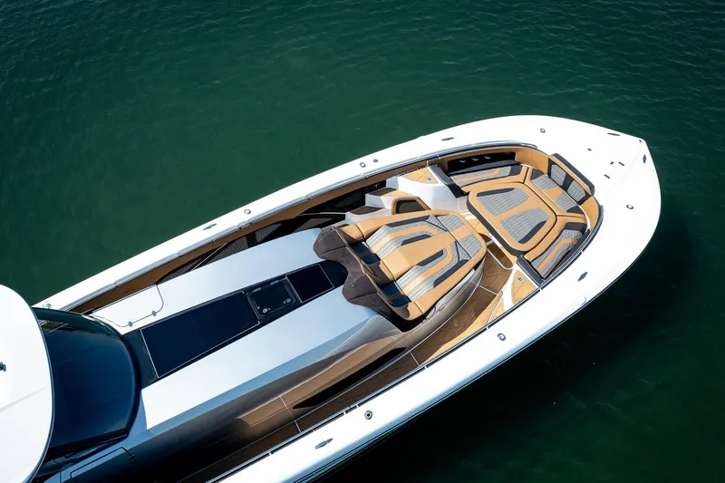 Slide: The Image of Luxurious 2022 MTI V50 yacht with sleek design and spacious deck on calm water. - 16