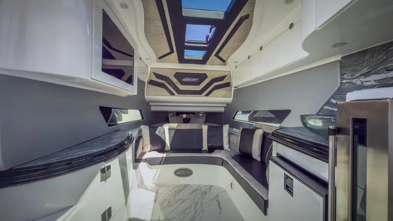 Slide: The Image of Luxurious interior of 2022 MTI V50 boat with modern design and skylight. - 19