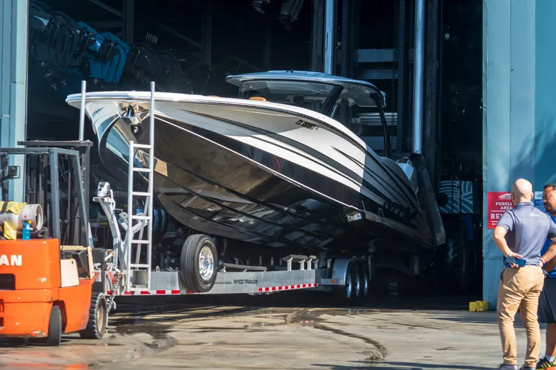 Slide: The Image of 2022 MTI V50 boat being transported from storage facility. - 4