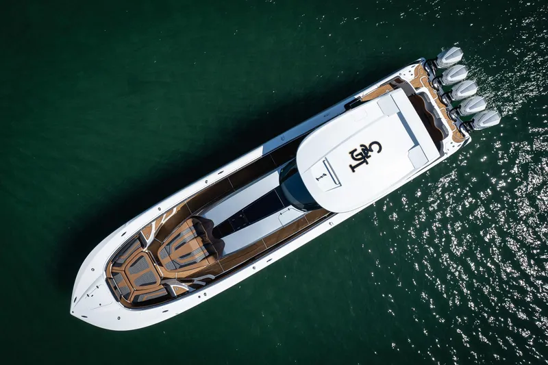 Slide: The Image of Aerial view of 2022 MTI V50 yacht on green water. - 6