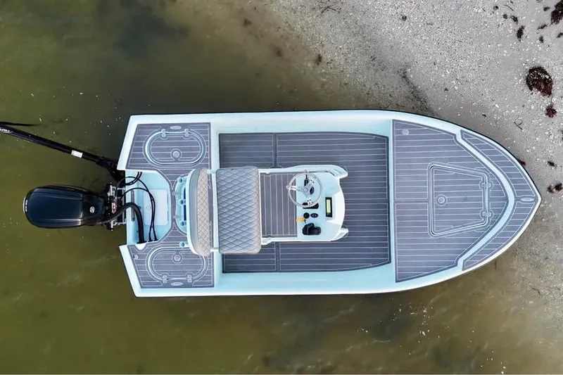 Slide: The Image of Overhead view of a 2001 Pro Sports 16 boat on sandy shore. - 15