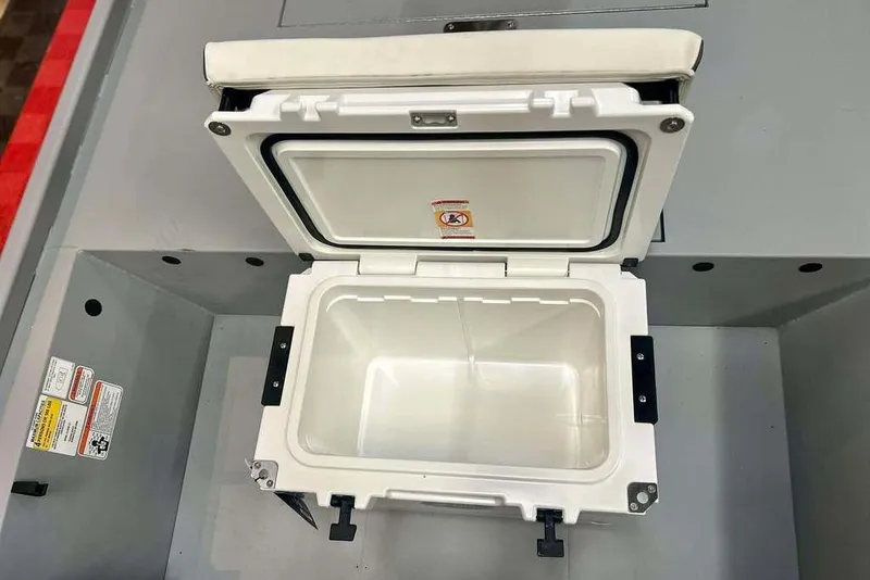 Slide: The Image of Open storage compartment in 2026 Tracker Bass Tracker Classic CC boat. - 15