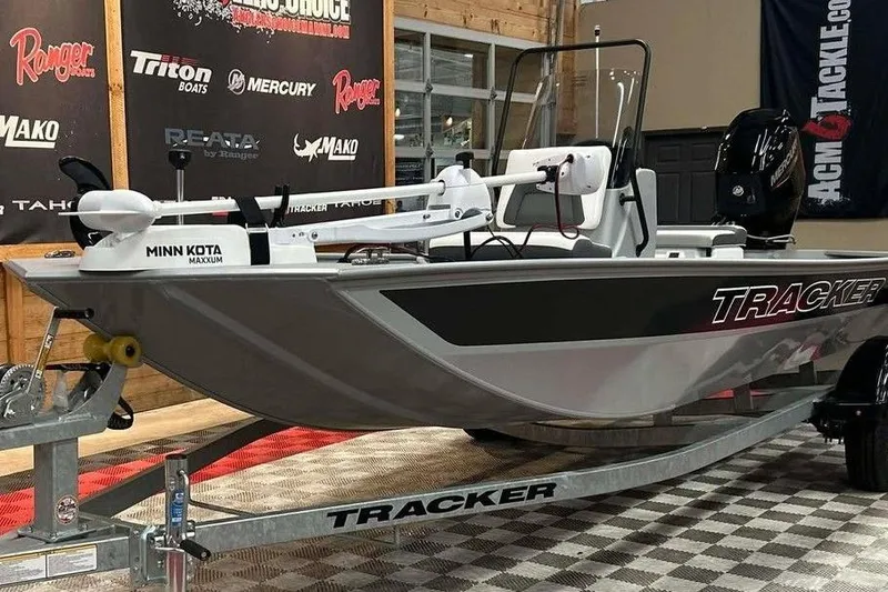 Slide: The Image of 2026 Tracker Bass Tracker Classic CC boat on display with Minn Kota Maxxum motor. - 5