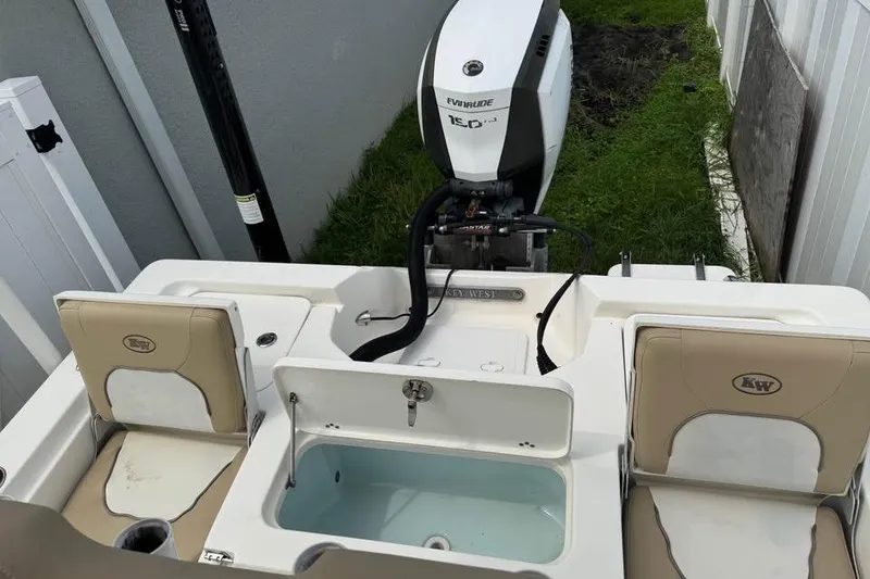 Slide: The Image of 2018 Key West 210 Bay Reef boat hull on trailer, viewed from below. - 10