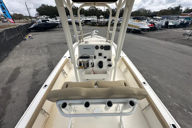Slide: The Image of 2018 Key West 210 Bay Reef boat interior with steering console and seating. - 13