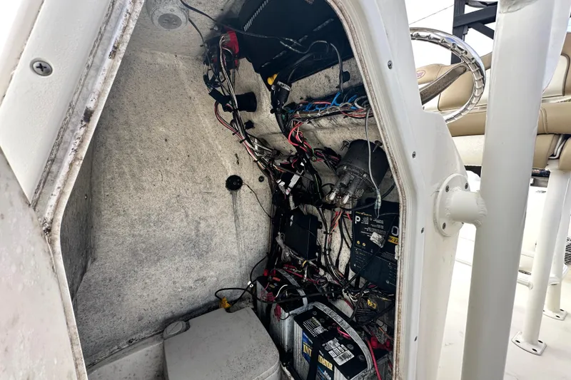 Slide: The Image of 2018 Key West 210 Bay Reef boat wiring and battery compartment interior. - 25