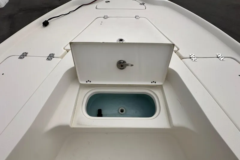 Slide: The Image of 2018 Key West 210 Bay Reef boat with open storage compartment on deck. - 29