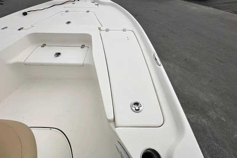 Slide: The Image of 2018 Key West 210 Bay Reef boat deck with storage compartments. - 33
