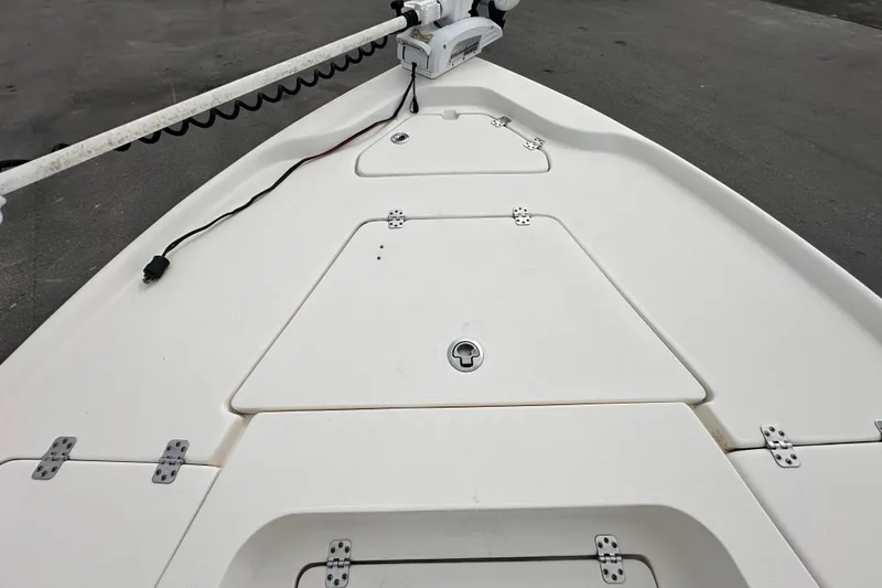 Slide: The Image of 2018 Key West 210 Bay Reef boat deck with storage compartments and trolling motor. - 35