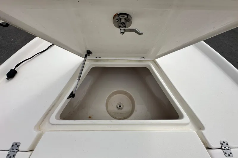 Slide: The Image of Open storage compartment on a 2018 Key West 210 Bay Reef boat. - 36