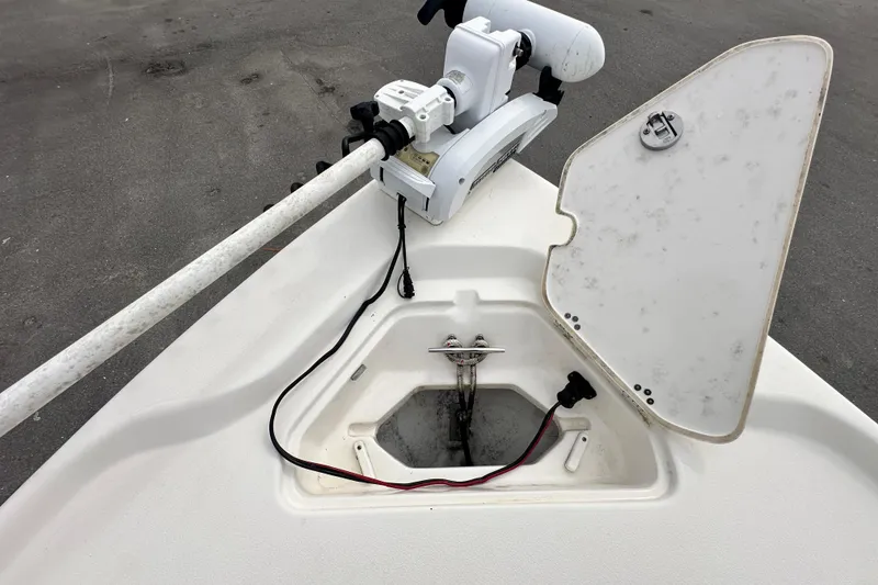 Slide: The Image of 2018 Key West 210 Bay Reef boat with open hatch and trolling motor. - 37