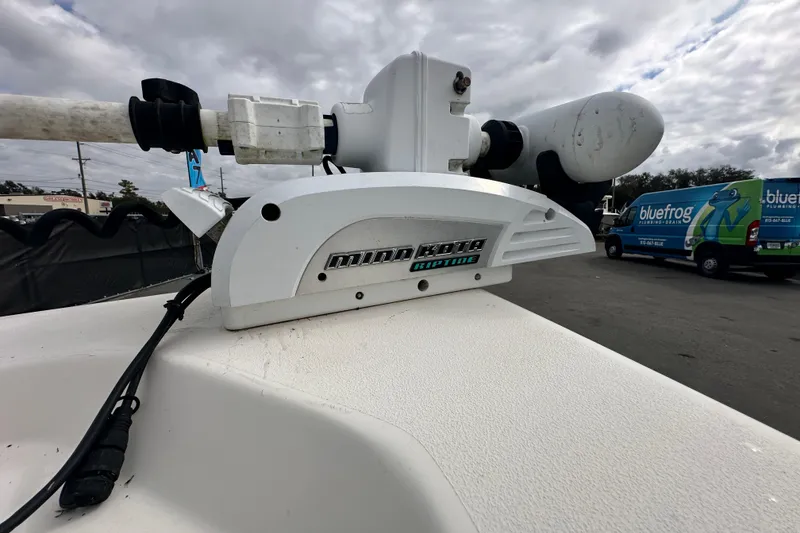 Slide: The Image of Minn Kota Riptide motor on 2018 Key West 210 Bay Reef boat, cloudy sky background. - 39