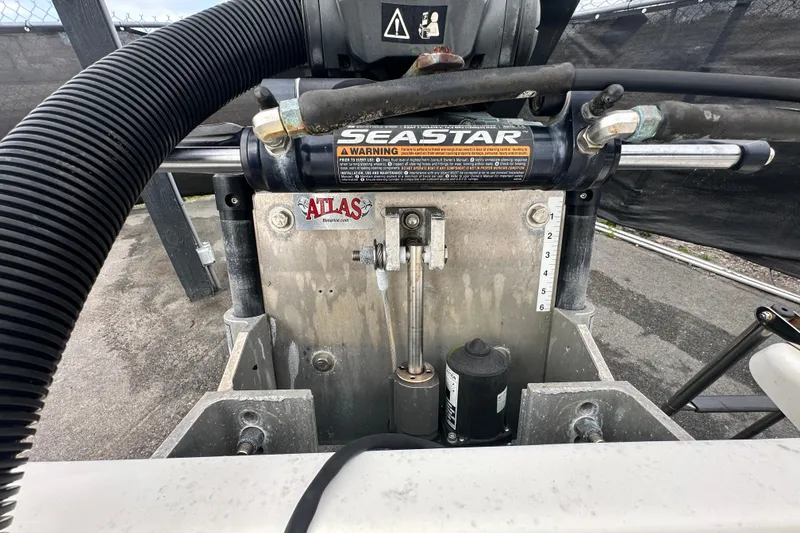 Slide: The Image of Hydraulic steering system on a 2018 Key West 210 Bay Reef boat. - 57