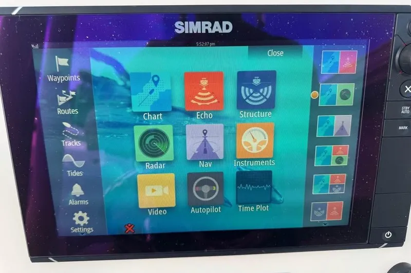 Slide: The Image of 2018 Key West 210 Bay Reef boat on trailer, outdoor display. - 8