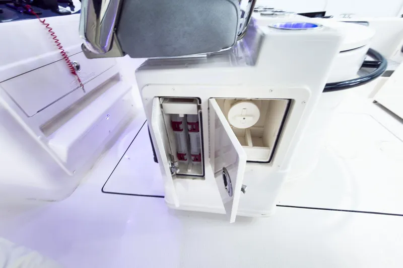 Slide: The Image of 2026 Sea Chaser 27 HFC CC boat interior with open storage compartment. - 22