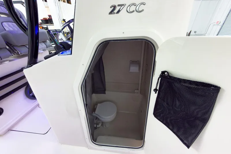 Slide: The Image of Interior view of 2026 Sea Chaser 27 HFC CC boat's compact restroom. - 30
