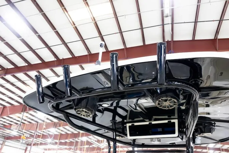 Slide: The Image of Manufacturer Provided Image: 2026 Sea Chaser 27 HFC CC boat roof with fishing rod holders. - 9