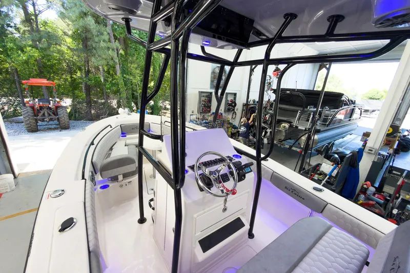 Slide: The Image of 2026 Sea Chaser 22 HFC boat interior in a workshop setting. - 14